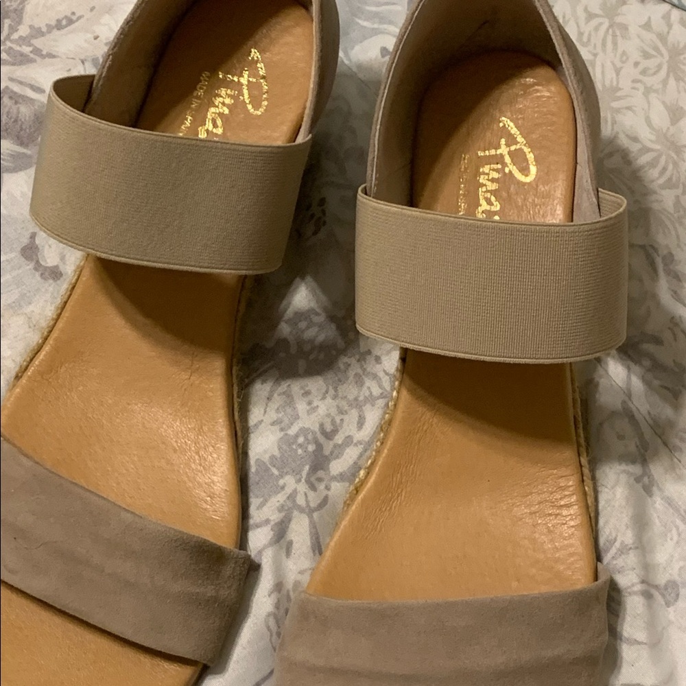 Suede slip on Pinaz brand wedge sandals. Stretchy band over top of foot.